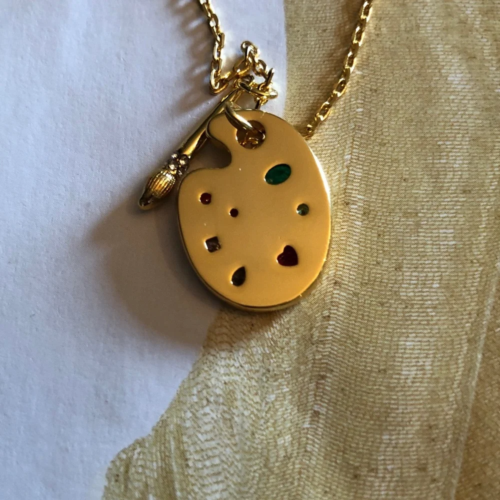 Authentic New with tag Kate spade Gold Artist Palette Necklace